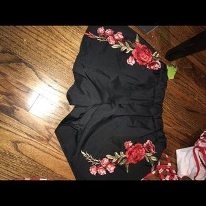 Black shorts with roses